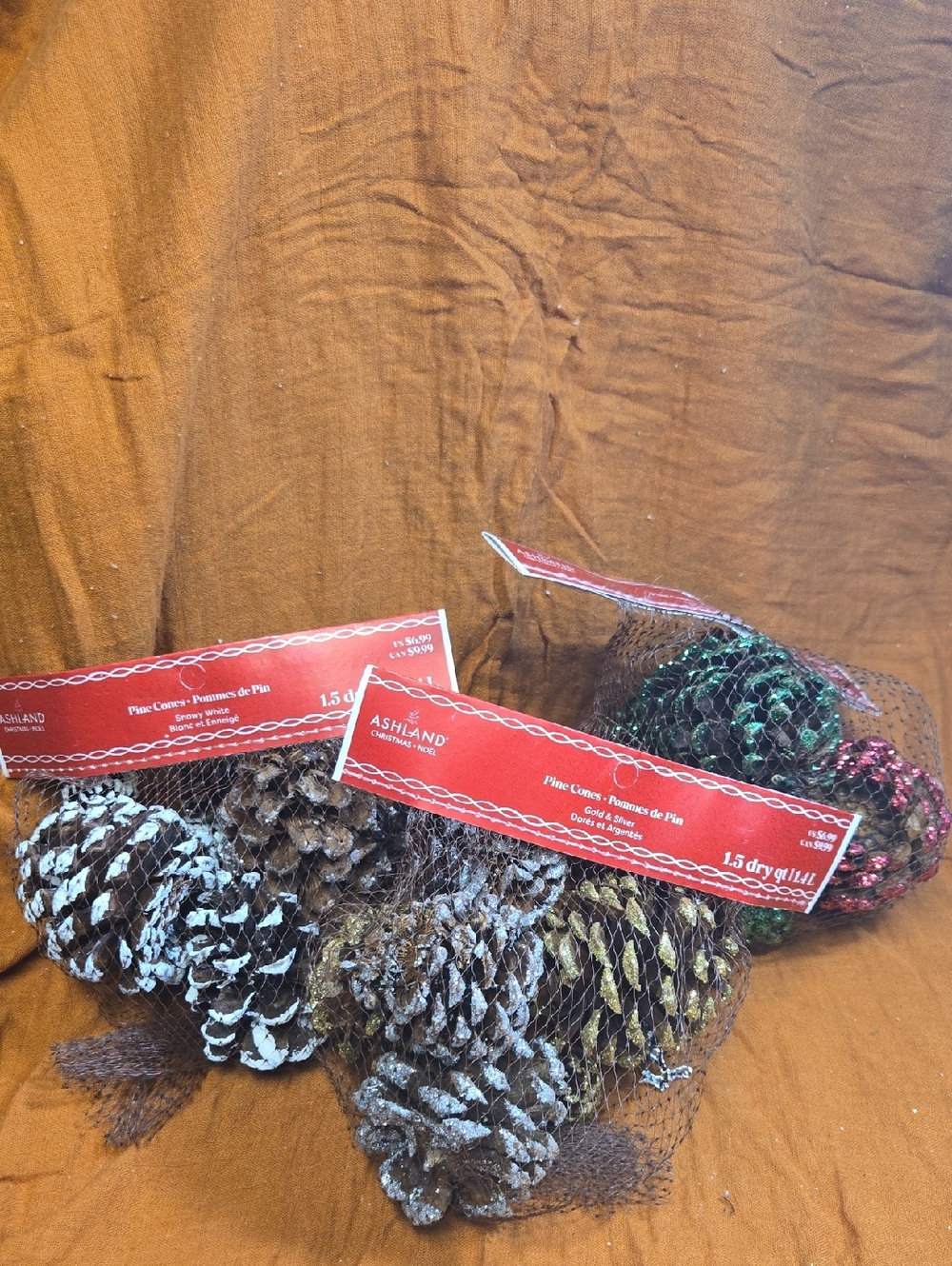 3 pack Ashland Natural Pine Cones with Painted Accents - White, Gold, Green, Red